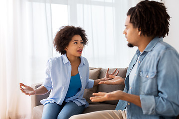 Image showing unhappy couple having argument at home