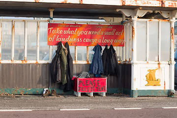 Image showing Shelter with Clothes for Homeless