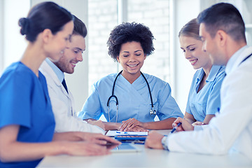 Image showing group of happy doctors meeting at hospital office