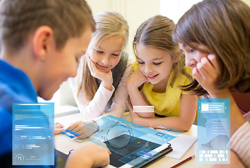 Image showing group of school kids with tablet pc in classroom