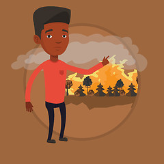 Image showing Man standing on background of forest fire.