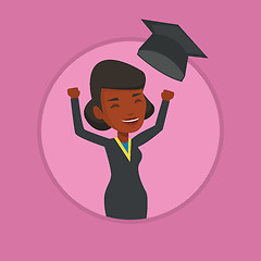 Image showing Graduate throwing up graduation hat.