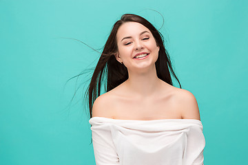 Image showing The young woman\'s portrait with happy emotions