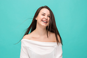 Image showing The young woman\'s portrait with happy emotions