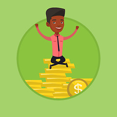 Image showing Happy businessman sitting on coins.