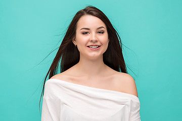 Image showing The young woman\'s portrait with happy emotions