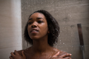 Image showing African American woman in the shower