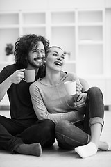 Image showing young couple in their new home