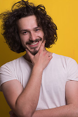 Image showing young man with funny hair over color background