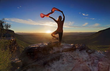 Image showing Woman Pilates Yoga balance  with sheer flowing fabric