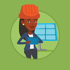 Image showing Female worker of solar power plant.