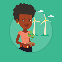 Image showing Woman holding small plant vector illustration.