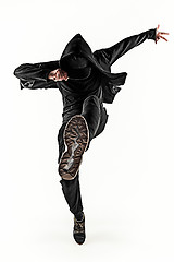 Image showing The silhouette of one hip hop male break dancer dancing on white background