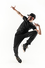 Image showing The silhouette of one hip hop male break dancer dancing on white background