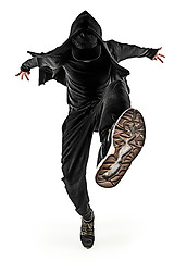 Image showing The silhouette of one hip hop male break dancer dancing on white background