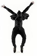 Image showing The silhouette of one hip hop male break dancer dancing on white background