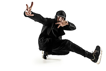 Image showing The silhouette of one hip hop male break dancer dancing on white background