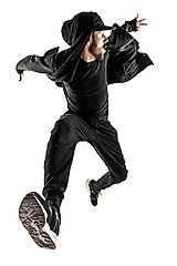 Image showing The silhouette of one hip hop male break dancer dancing on white background