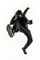 Image showing The silhouette of one hip hop male break dancer dancing on white background