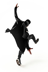 Image showing The silhouette of one hip hop male break dancer dancing on white background