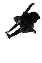 Image showing The silhouette of one hip hop male break dancer dancing on white background