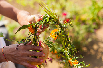Image showing Flower and grass garlands for Tihar in Nepal