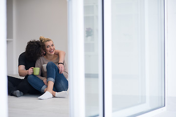 Image showing young couple in their new home