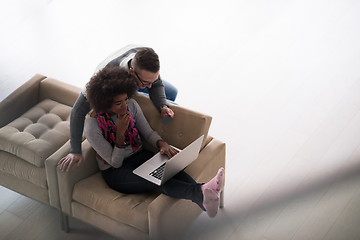 Image showing multiethnic couple shopping online