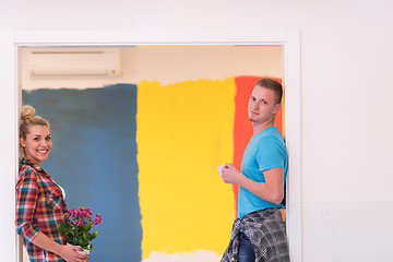 Image showing multiethnic couple renovating their home