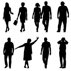 Image showing Set black silhouettes of beautiful man and woman on white background. illustration