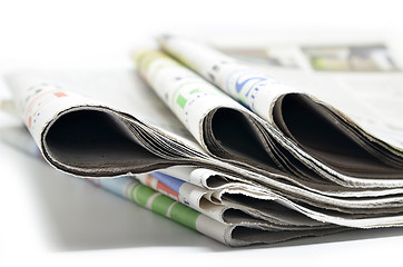 Image showing Newspapers folded and stacked