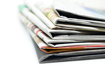 Image showing Newspapers folded and stacked