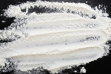 Image showing flour on black