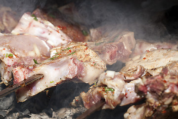 Image showing meat in the grill
