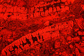 Image showing Firewood background with charcoal in red color