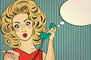 Image showing Surprised pop art woman with retro phone, who tells her secrets.