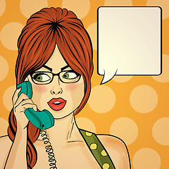 Image showing Surprised pop art woman chatting on retro phone . Comic woman wi