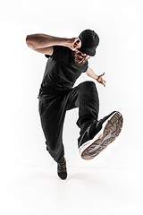 Image showing The silhouette of one hip hop male break dancer dancing on white background