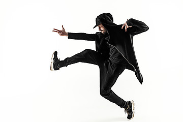Image showing The silhouette of one hip hop male break dancer dancing on white background