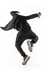 Image showing The silhouette of one hip hop male break dancer dancing on white background