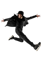 Image showing The silhouette of one hip hop male break dancer dancing on white background