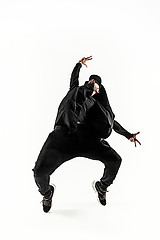 Image showing The silhouette of one hip hop male break dancer dancing on white background