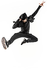 Image showing The silhouette of one hip hop male break dancer dancing on white background