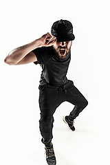 Image showing The silhouette of one hip hop male break dancer dancing on white background