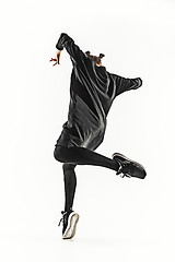 Image showing The silhouette of one hip hop male break dancer dancing on white background