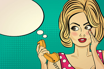 Image showing Sexy pop art woman talking on a retro phone