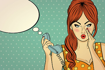 Image showing Sexy pop art woman talking on a retro phone