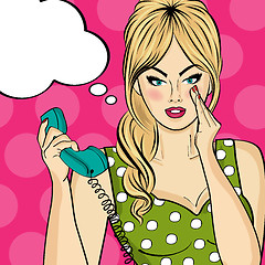 Image showing Sexy pop art woman talking on a retro phone