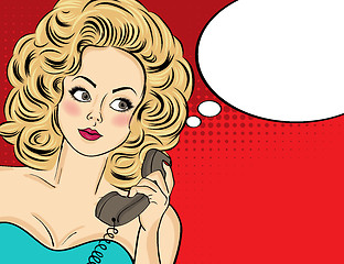 Image showing Sexy pop art woman in party dress talking on a retro phone and s