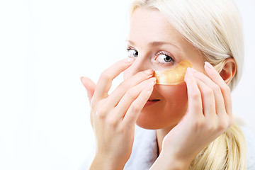 Image showing Gold mask, skin care around the eyes  Gold pads, reduction of wrinkles